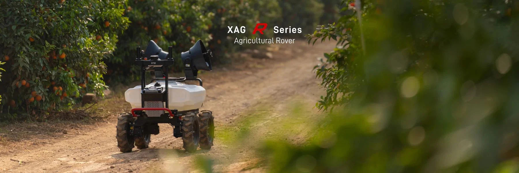 XAG R Series agricultural rover operating in an orchard